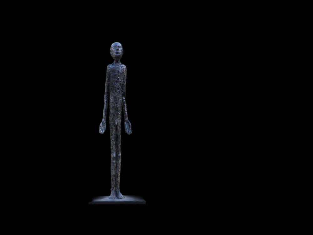 Statue of human form in bronze